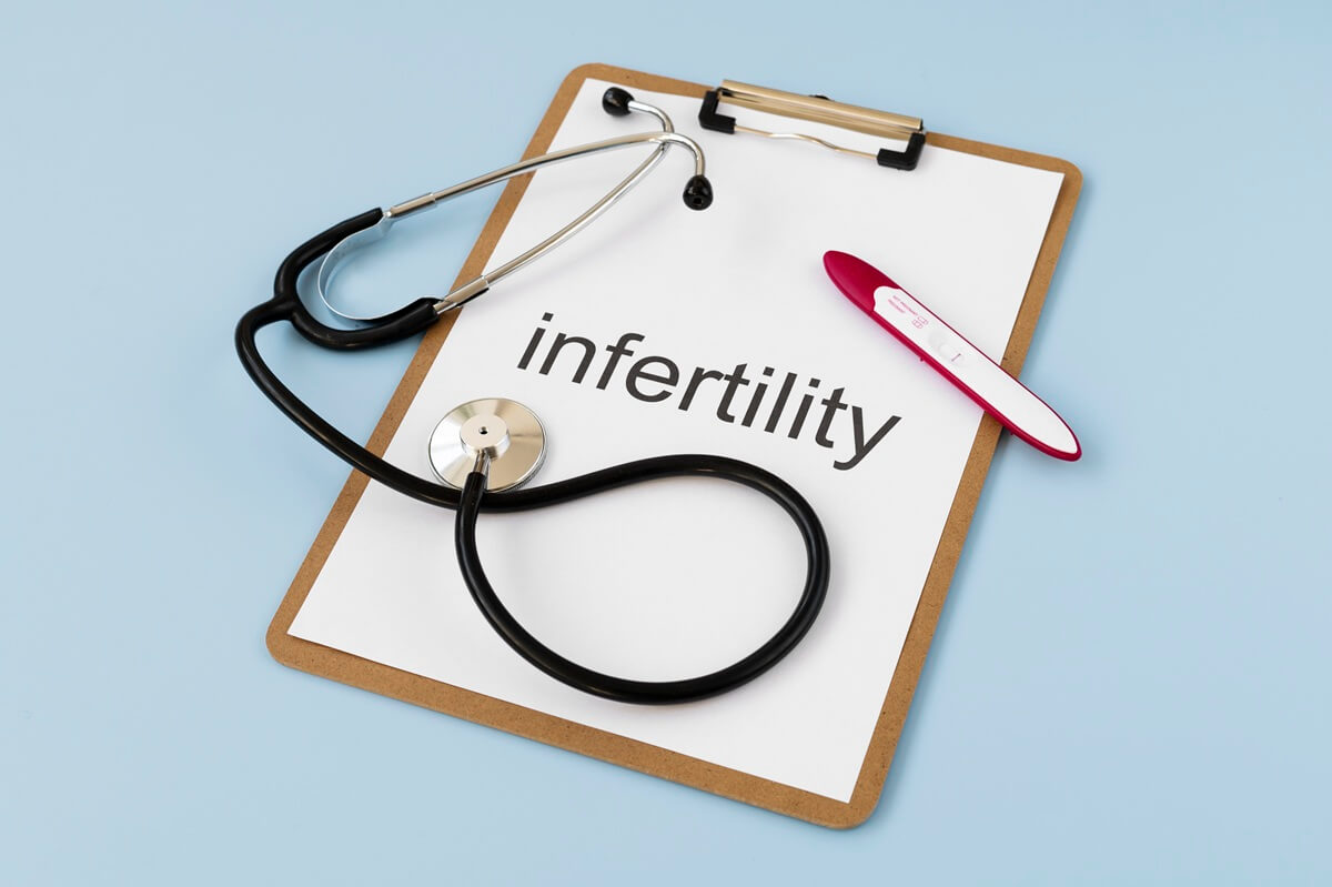 top view infertility word written paper