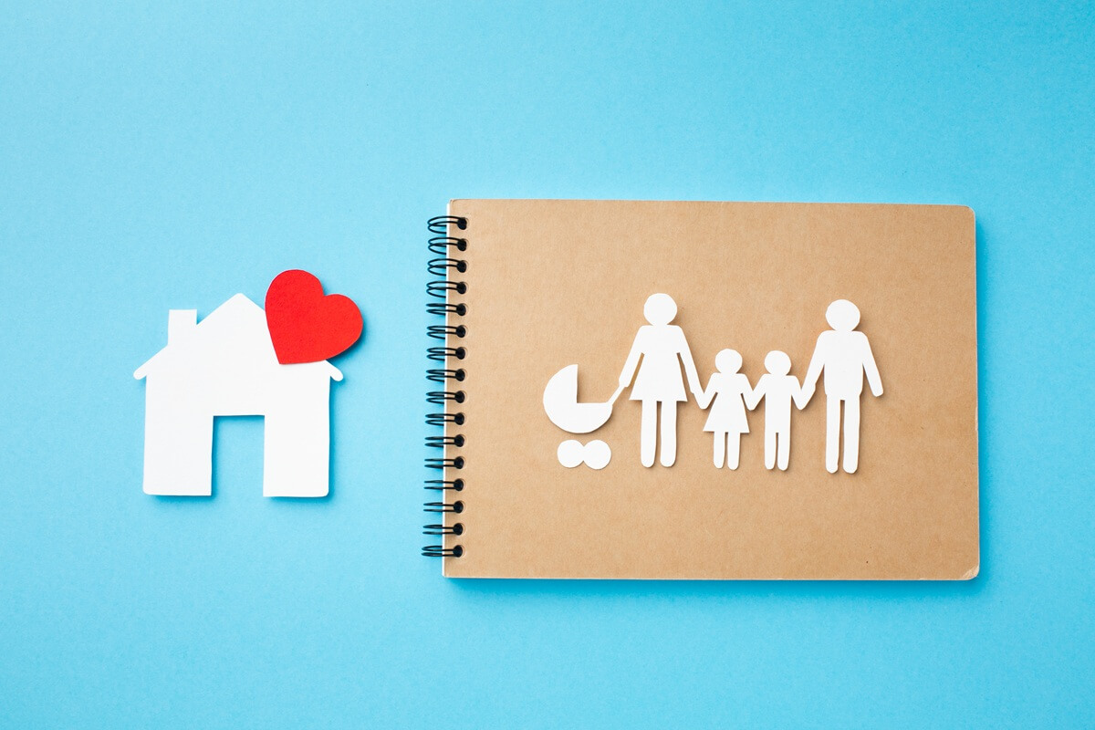 top view notebook with family figure home